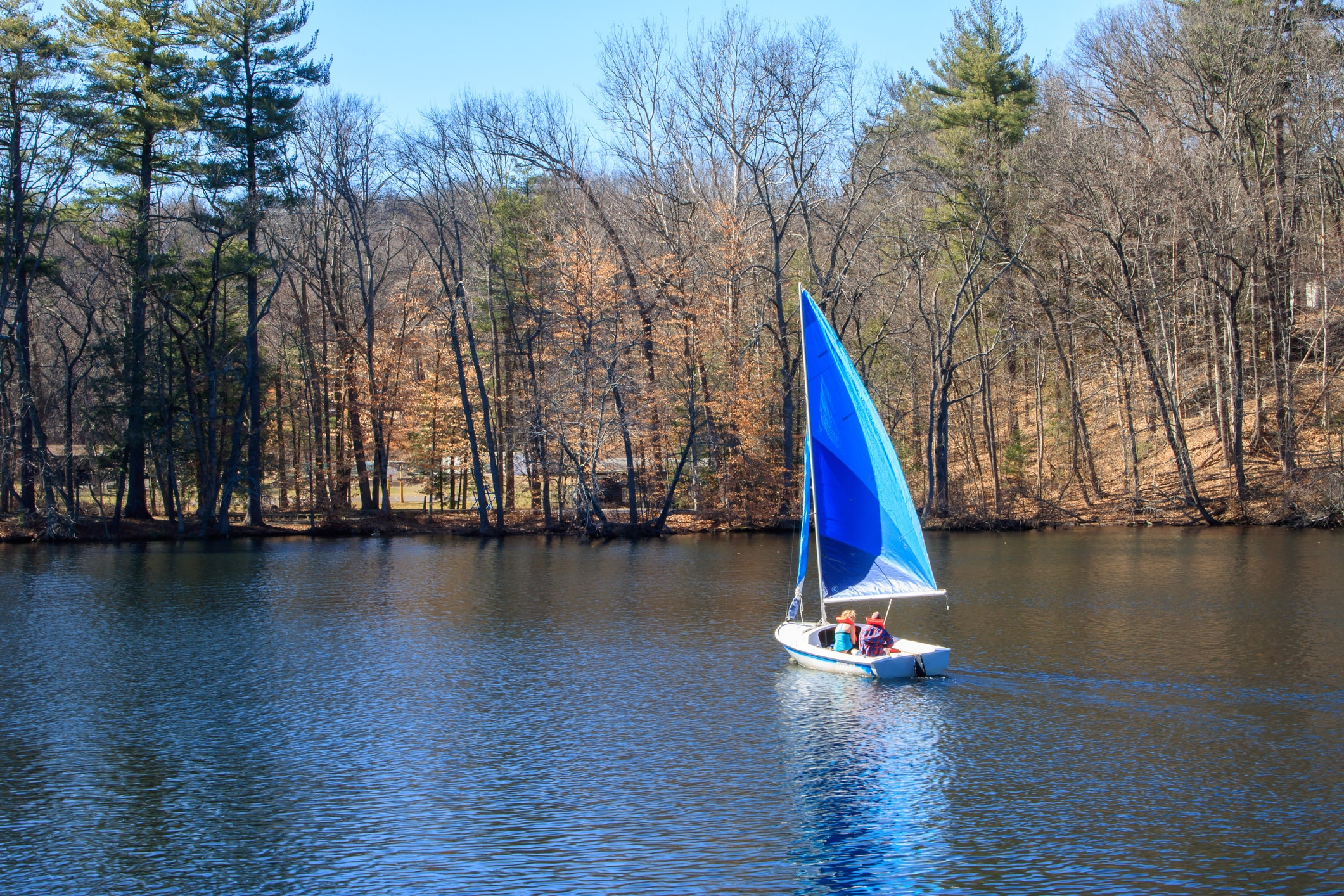 couple in sail boat on Connecticut water couple in sail boat on Connecticut water